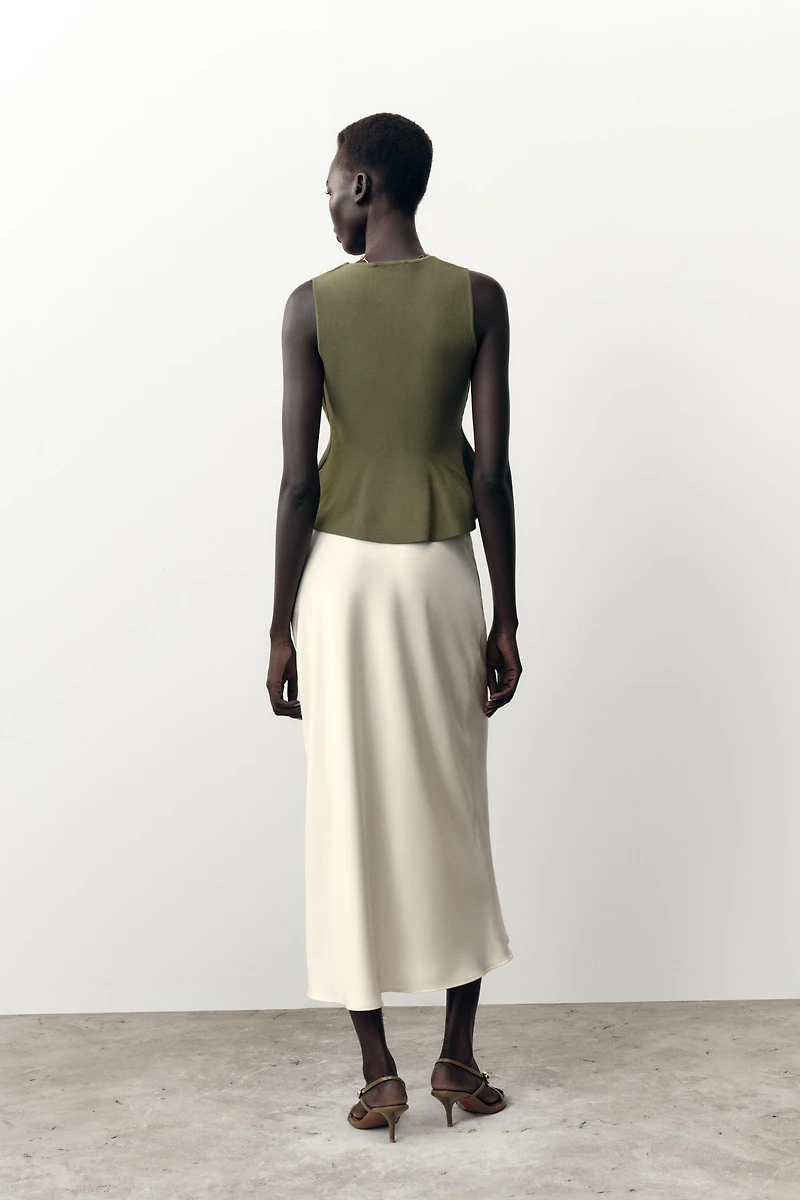 PEPLUM KNIT TOP