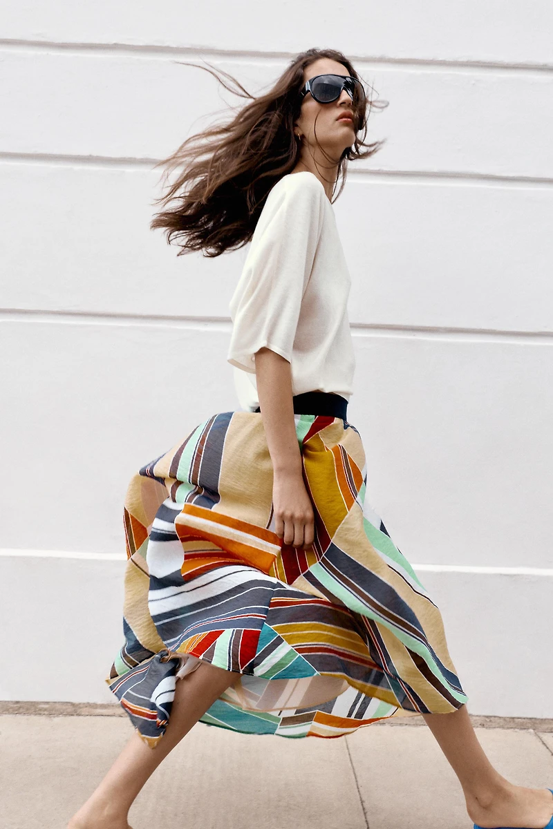 ASYMMETRIC PRINTED MIDI SKIRT