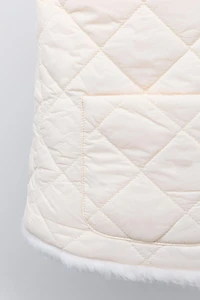 REVERSIBLE FAUX FUR VEST