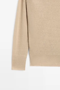 Flowing 100% linen off-the-shoulder sweater