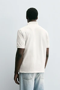 TEXTURED WEAVE PIQUÉ POLO SHIRT