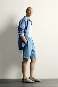 RELAXED FIT PLEATED DENIM CHINO SHORTS