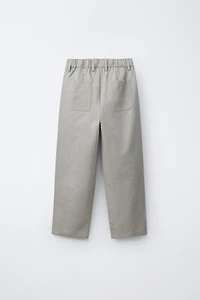FLOWY PLEATED PANTS
