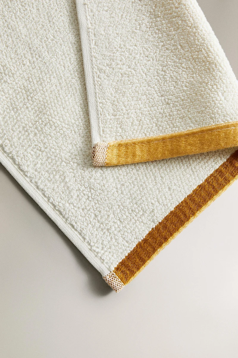 BATH TOWEL WITH RICE STITCH COLORED EDGE
