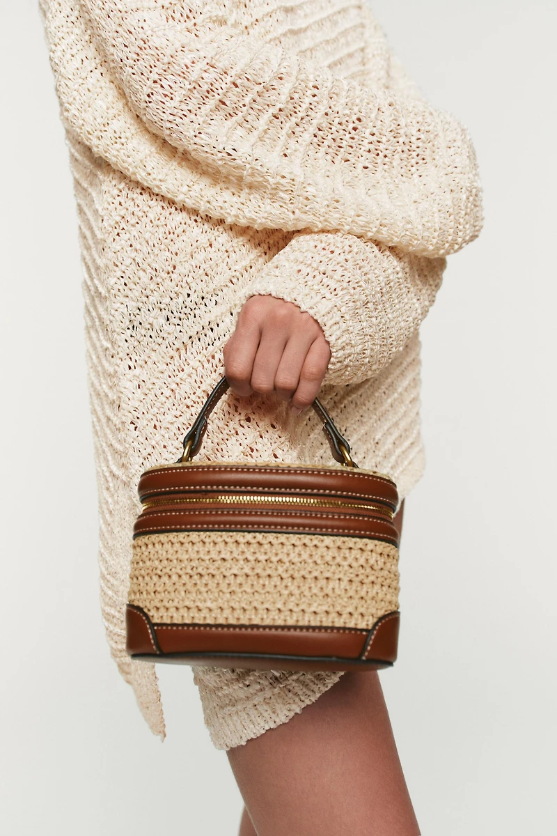 WOVEN VANITY BAG