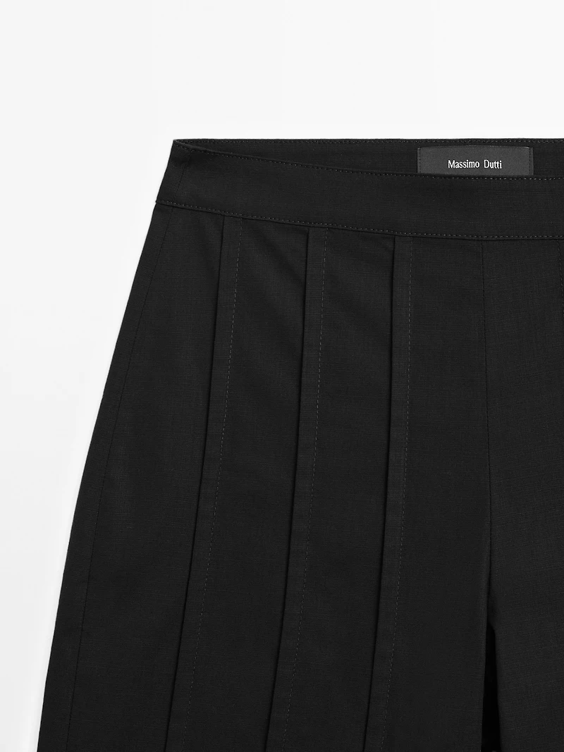 Wide-leg trousers with seam details