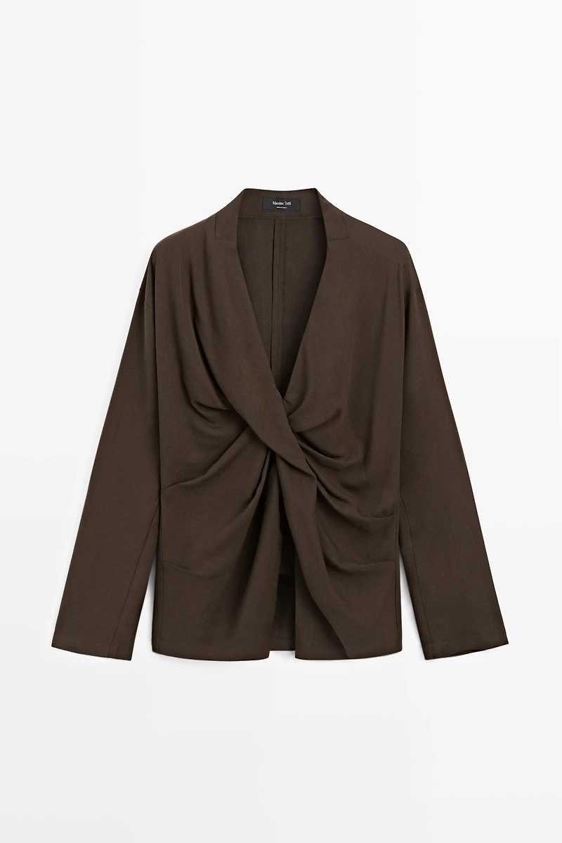Flowing blouse with draped detail