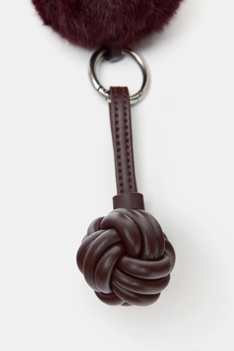 KNOT FAUX FUR CHARM