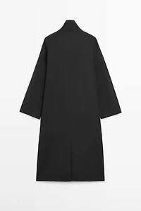 Double-breasted technical trench coat