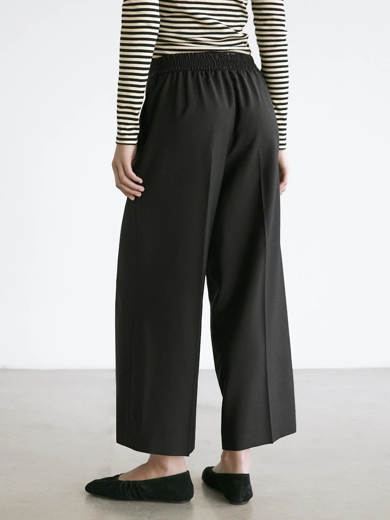 100% wool cropped wide-leg elasticated trousers