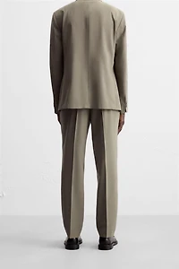 TEXTURED SUIT PANTS