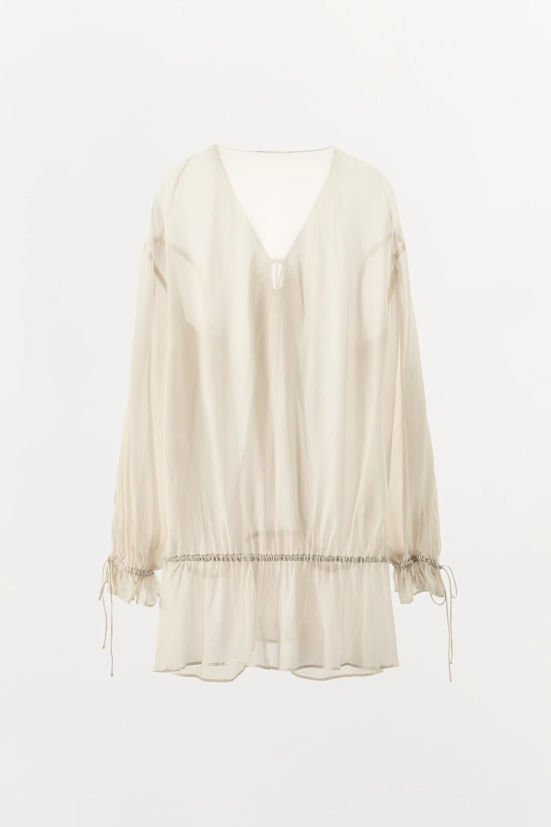TOP SEMI-TRANSPARENT FLUIDE