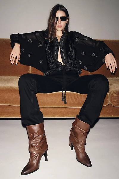 FRINGED LEATHER ANKLE BOOTS