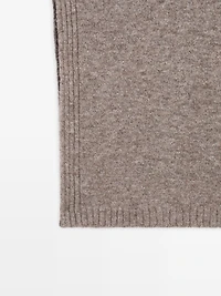Sleeveless high neck sweater
