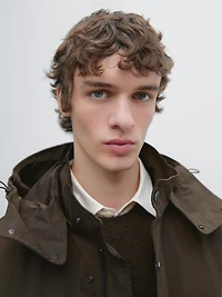 Long technical parka with detachable interior