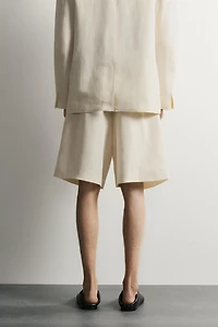 WIDE FIT PLEATED SHORTS