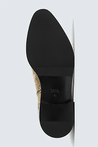 ANIMAL PRINT LEATHER BOOTS