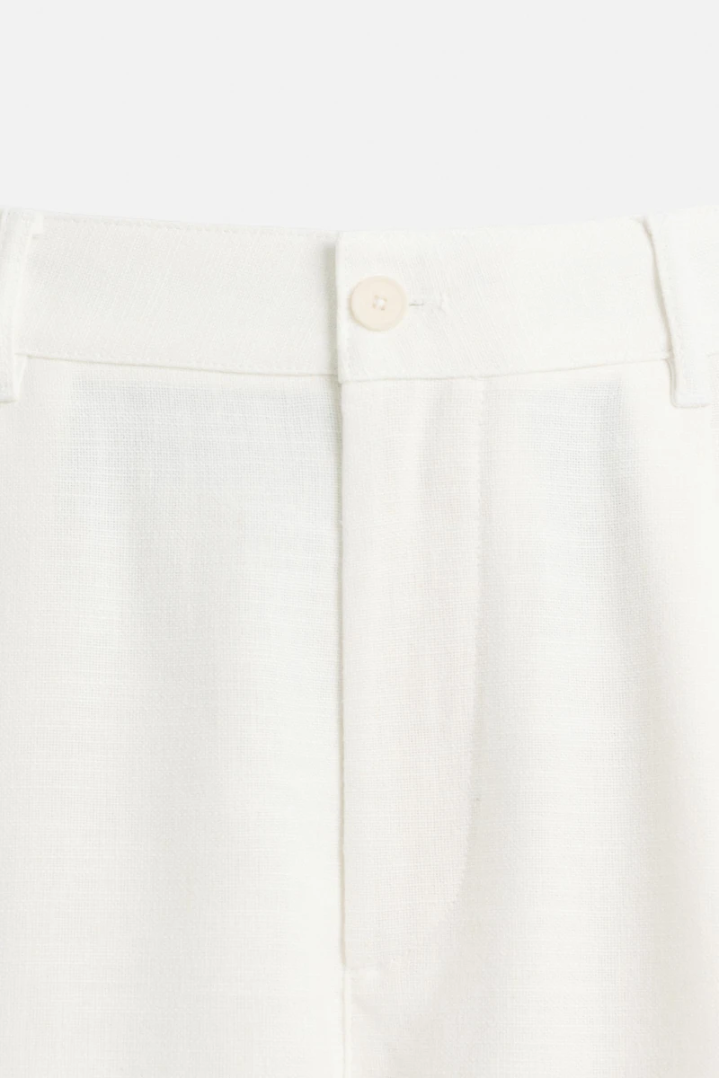 PLEATED RELAXED FIT PANTS