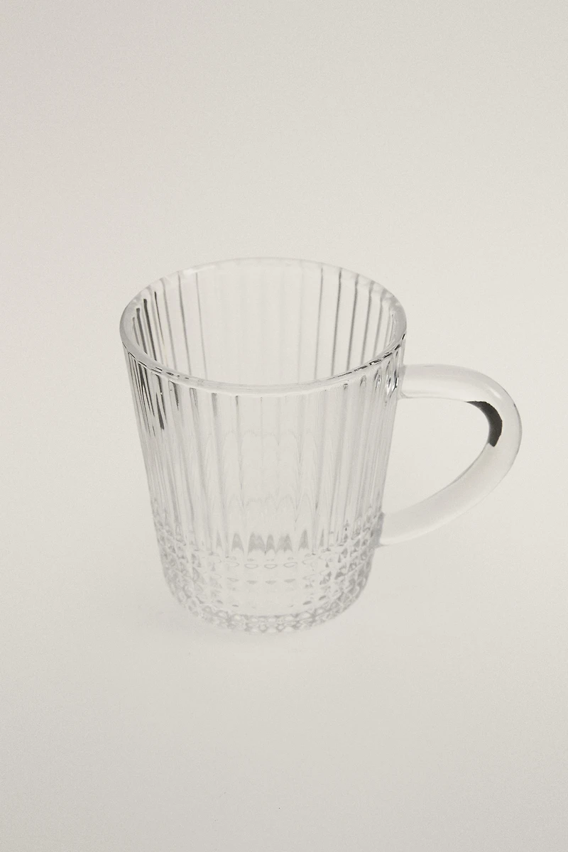 GLASS MUG WITH A RAISED GEOMETRIC DESIGN