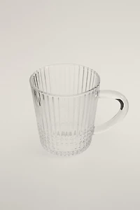 GLASS MUG WITH A RAISED GEOMETRIC DESIGN