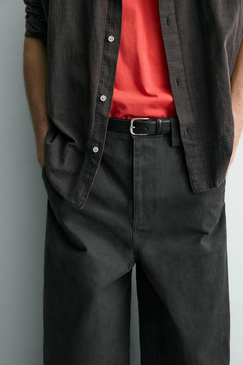 RELAXED FIT PANTS WITH TWISTED SEAM