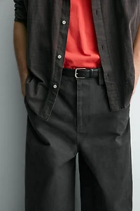 RELAXED FIT PANTS WITH TWISTED SEAM