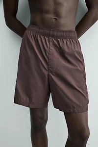 LONG CARGO SWIMSUIT
