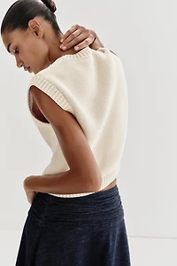 GILET EN MAILLE AVEC BOUTON DORÉ