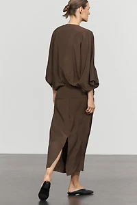 Fluid midi dress with gathered sash