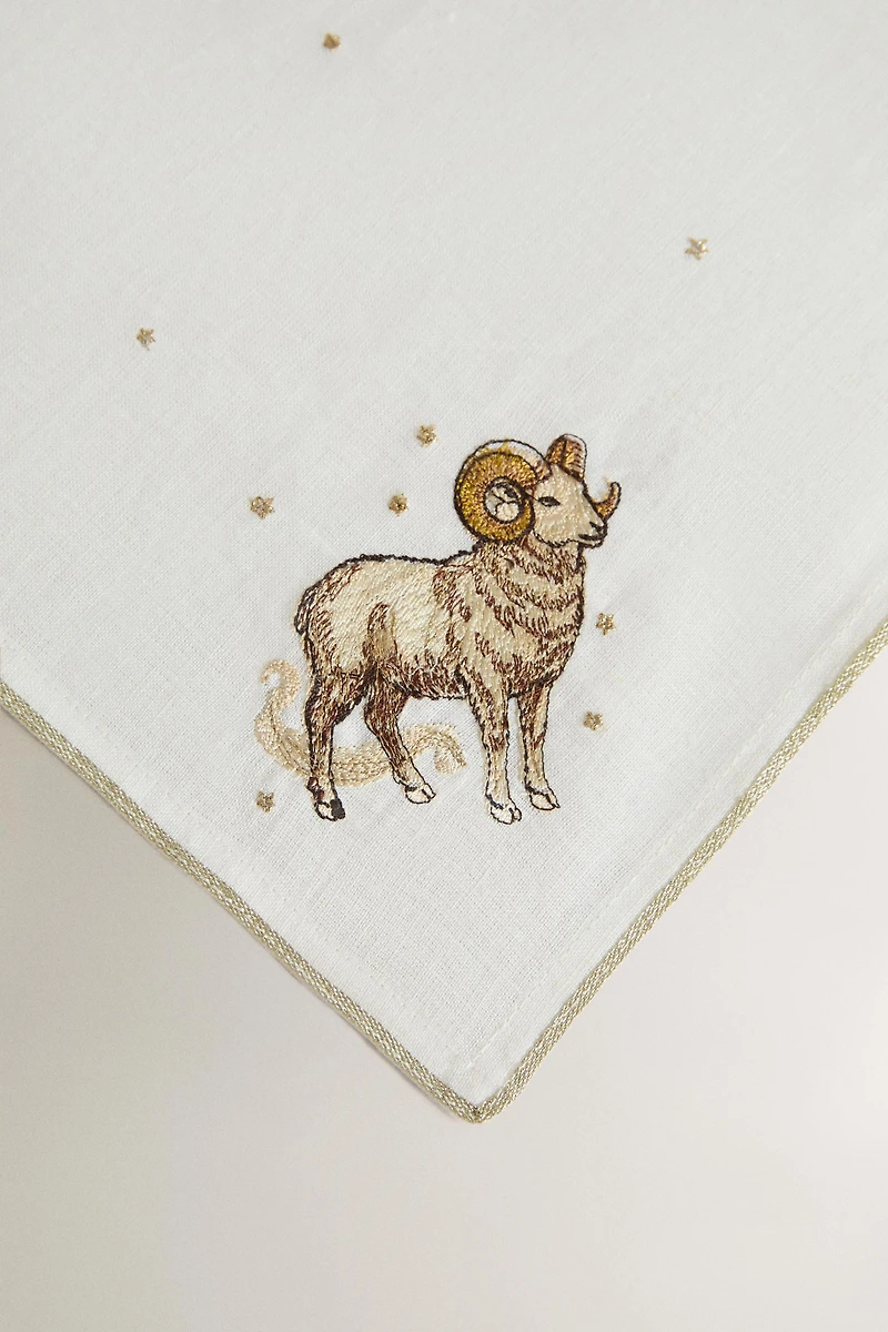 ARIES EMBROIDERED LINEN NAPKIN | MARISA BERENSON
