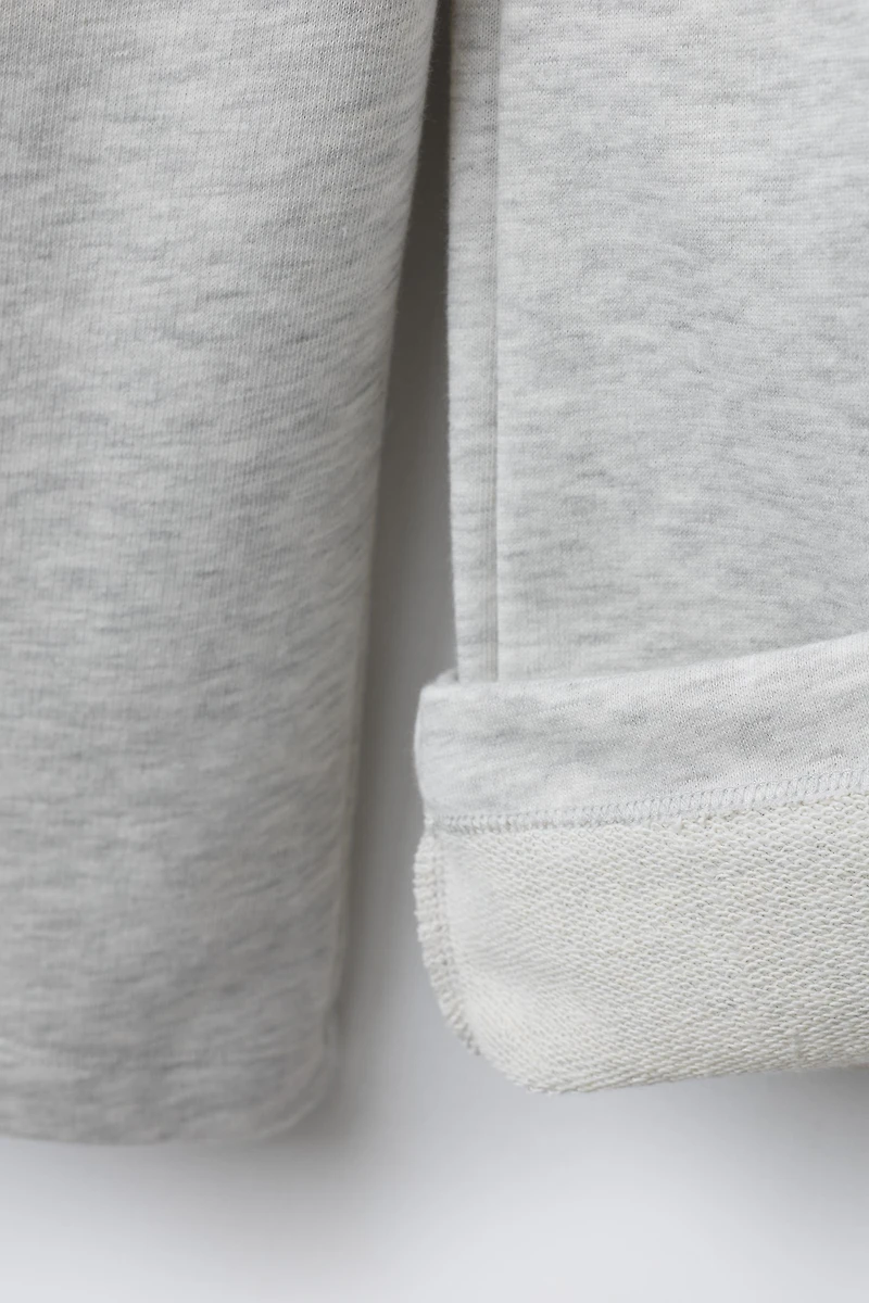 PANTALON EN MOLLETON À JAMBES LARGES ÉTOILES