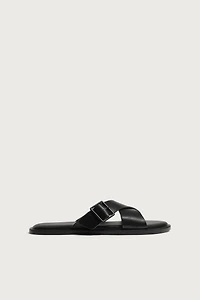 BUCKLED CRISSCROSS SANDALS