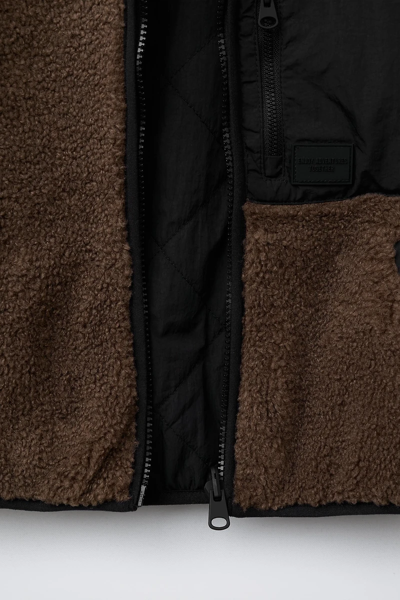REVERSIBLE FLEECE VEST