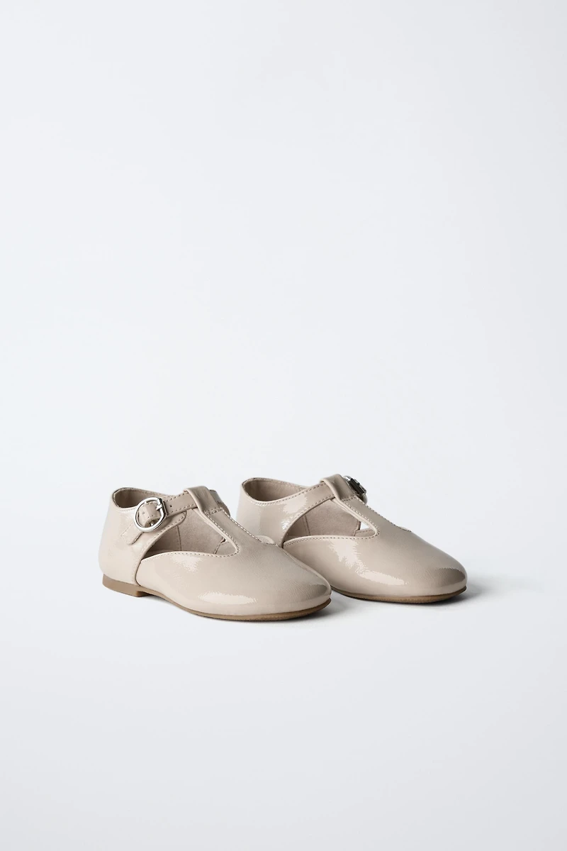 PATENT FINISH T-BAR BALLERINAS