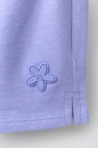 RUBBERIZED APPLIQUÉ PLUSH SHORTS
