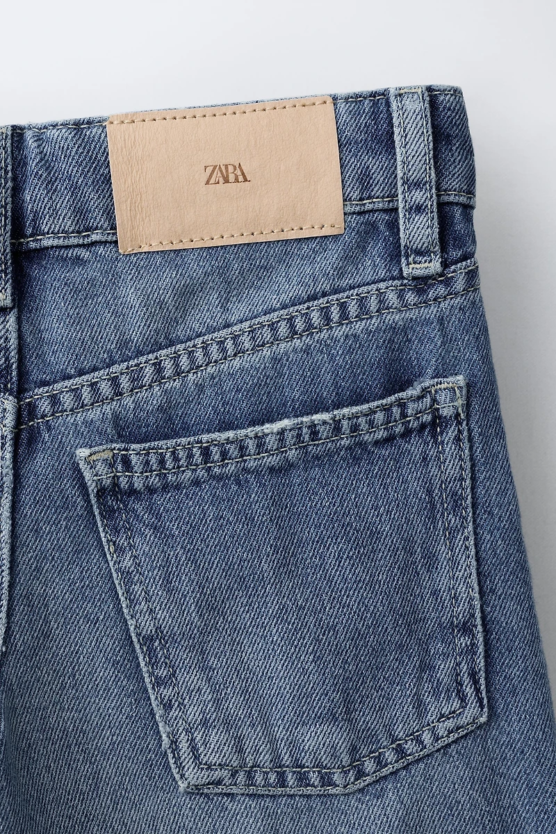 LONG RIPPED DENIM SHORTS
