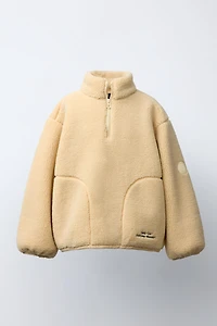 ZIP FAUX SHEARLING SWEATSHIRT