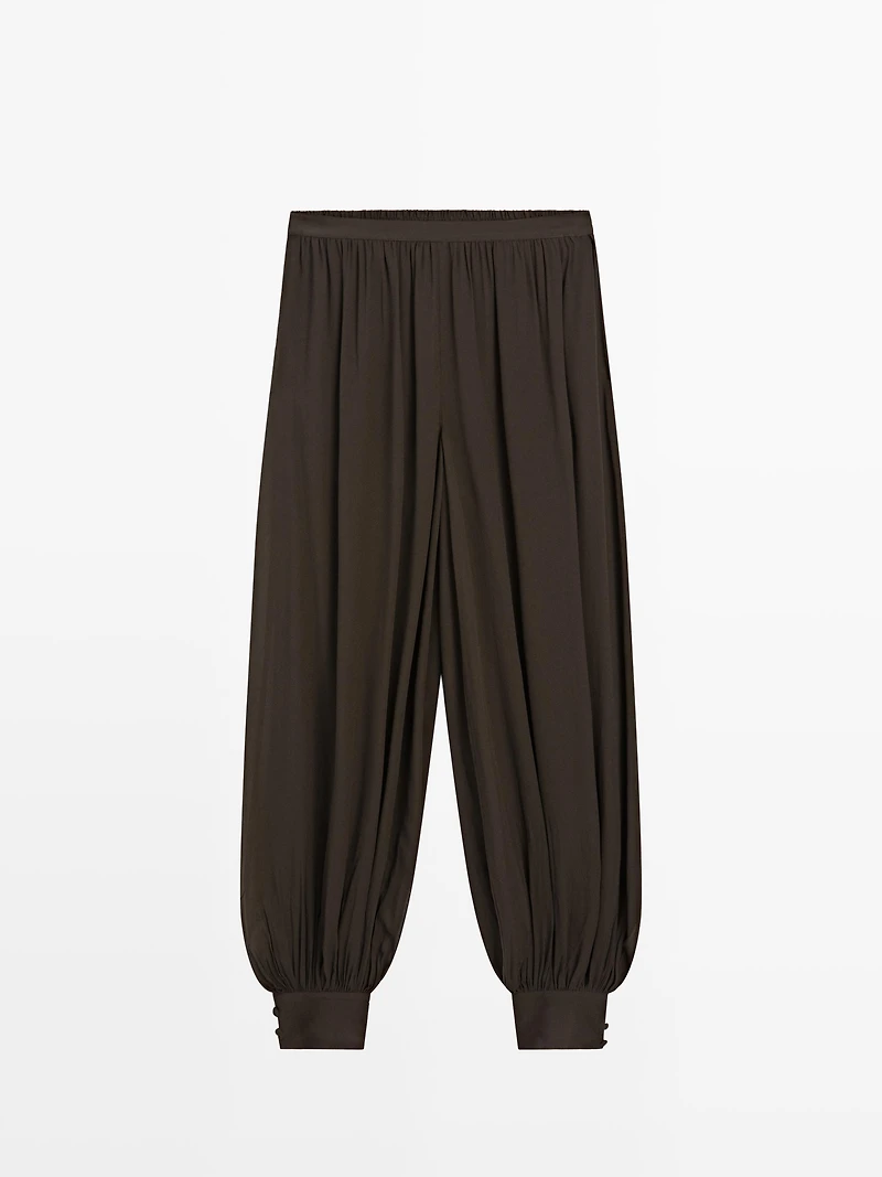 Pantalon bouffant semi-transparent avec boutons