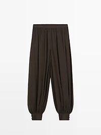 Pantalon bouffant semi-transparent avec boutons