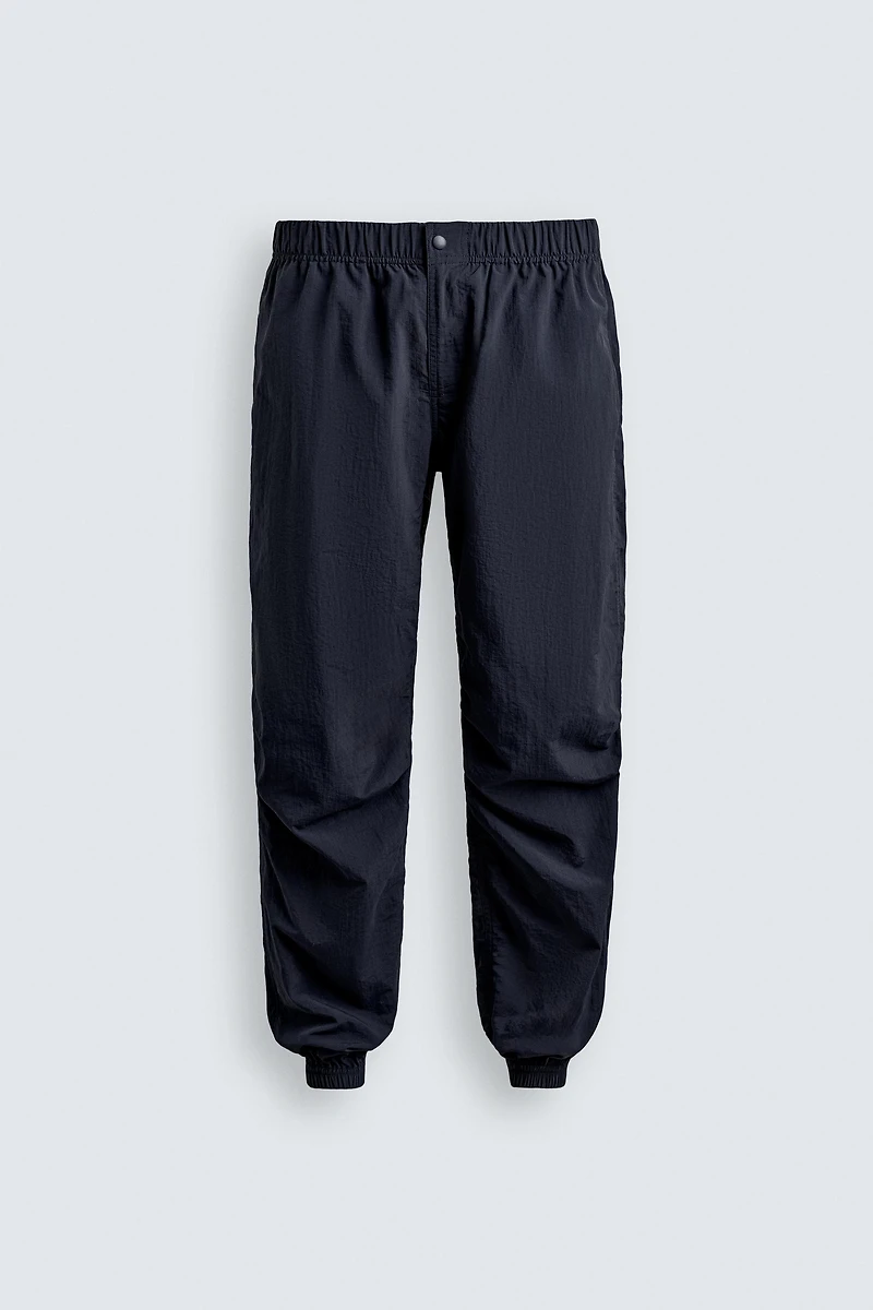 TECHNICAL RELAXED FIT PANTS