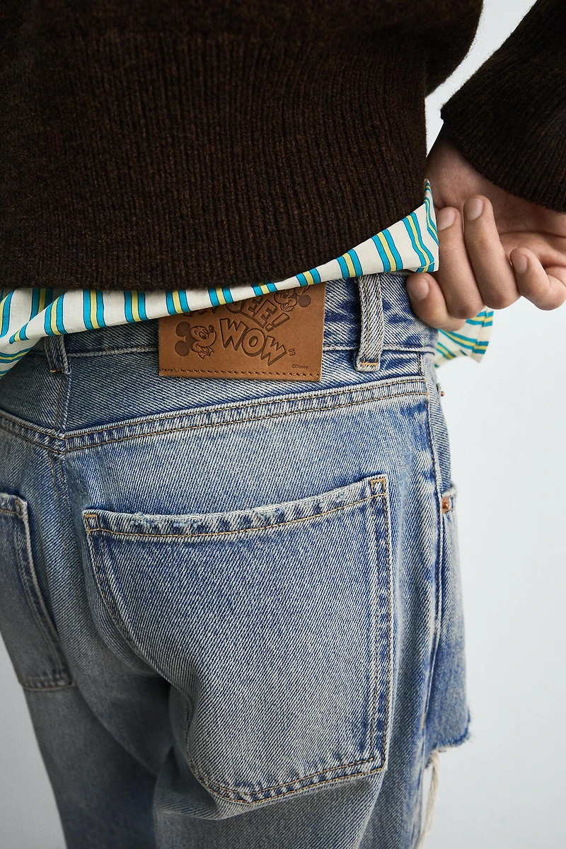 RIPPED FLARE FIT JEANS HARRY LAMBERT FOR ZARA X DISNEY