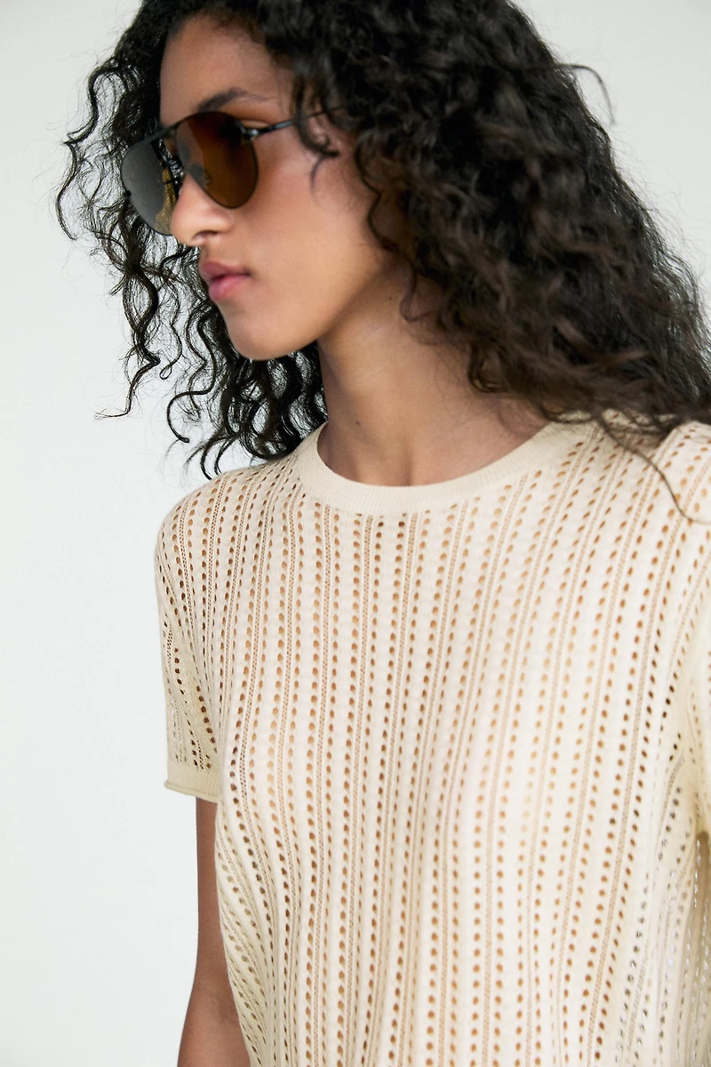 Short sleeve cutwork knit top