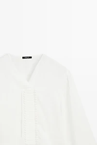 Flowing linen blend blouse with button detail