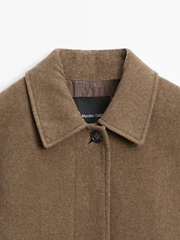 Mid-length wool blend coat with flap pockets