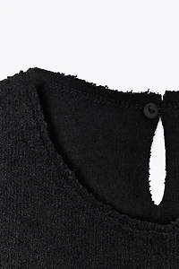 BOUCLÉ BUCKLE PEPLUM TOP