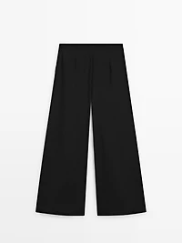 Flowing trousers with darts