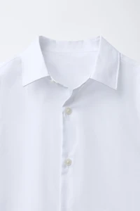CHEMISE UNIE HABILLÉE