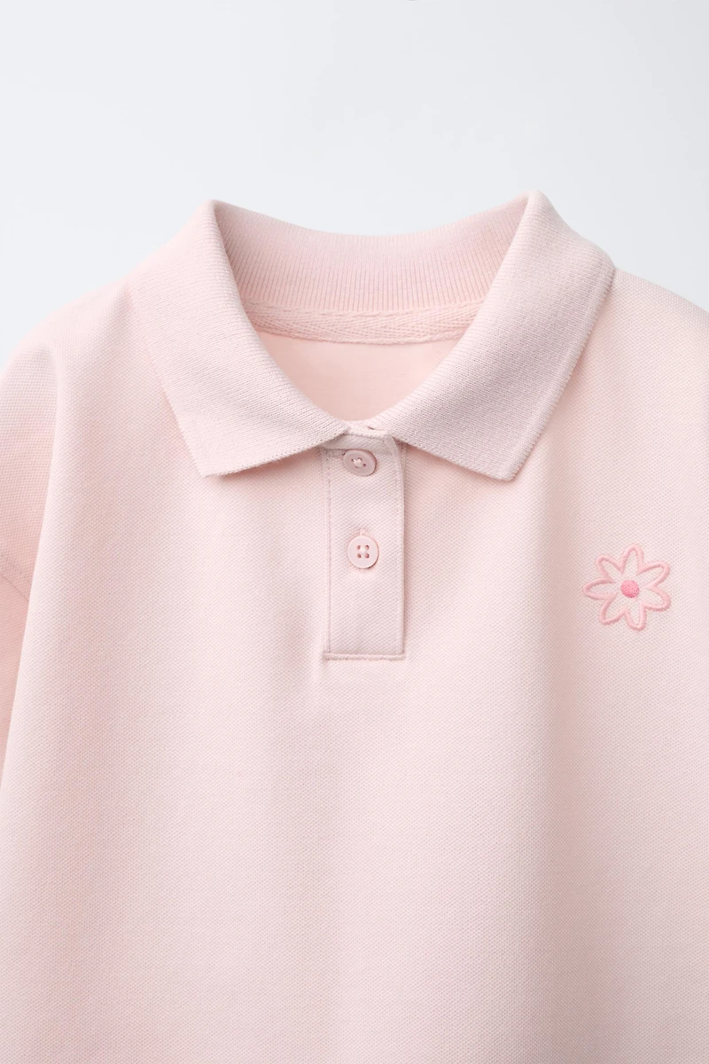 EMBROIDERED FLORAL PIQUÉ POLO