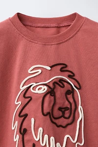 HAUT BRODÉ LION