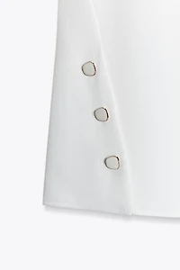 SLEEVELESS TOP WITH DEFINED SHOULDERS